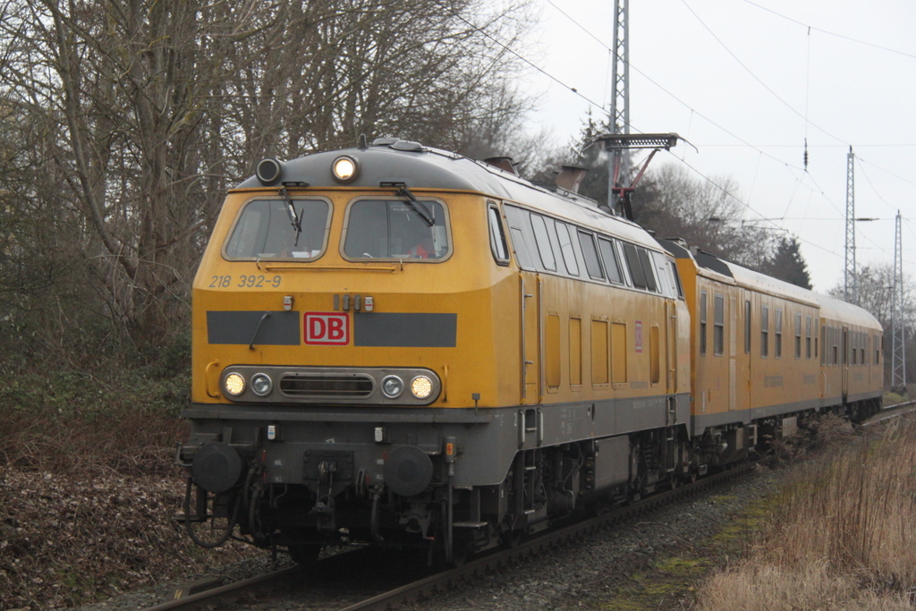 DB Netzinstandhaltung 218 392-9 mit Messzug zur Fahrwegmessung von Warnemnde Werft Richtung Rostock Hbf bei der Durchfahrt im Bahnhof Rostock-Bramow.06.02.2016