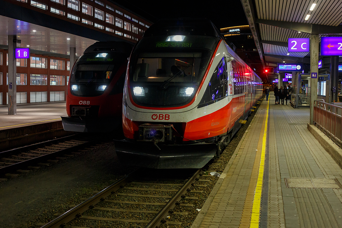 Der BB 4024 033-4, ein vierteiliger elektrischer TALENT, hat am Abend des 25.03.2022 um 20:40 Uhr, als RegionalExpress REX 2 (Hochfilzen – Kitzbhel – Wrgl - Innsbruck), den Zielbahnhof Innsbruck Hbf pnktlich erreicht. Dahinter auf Gleis 1 steht noch ein weiterer.