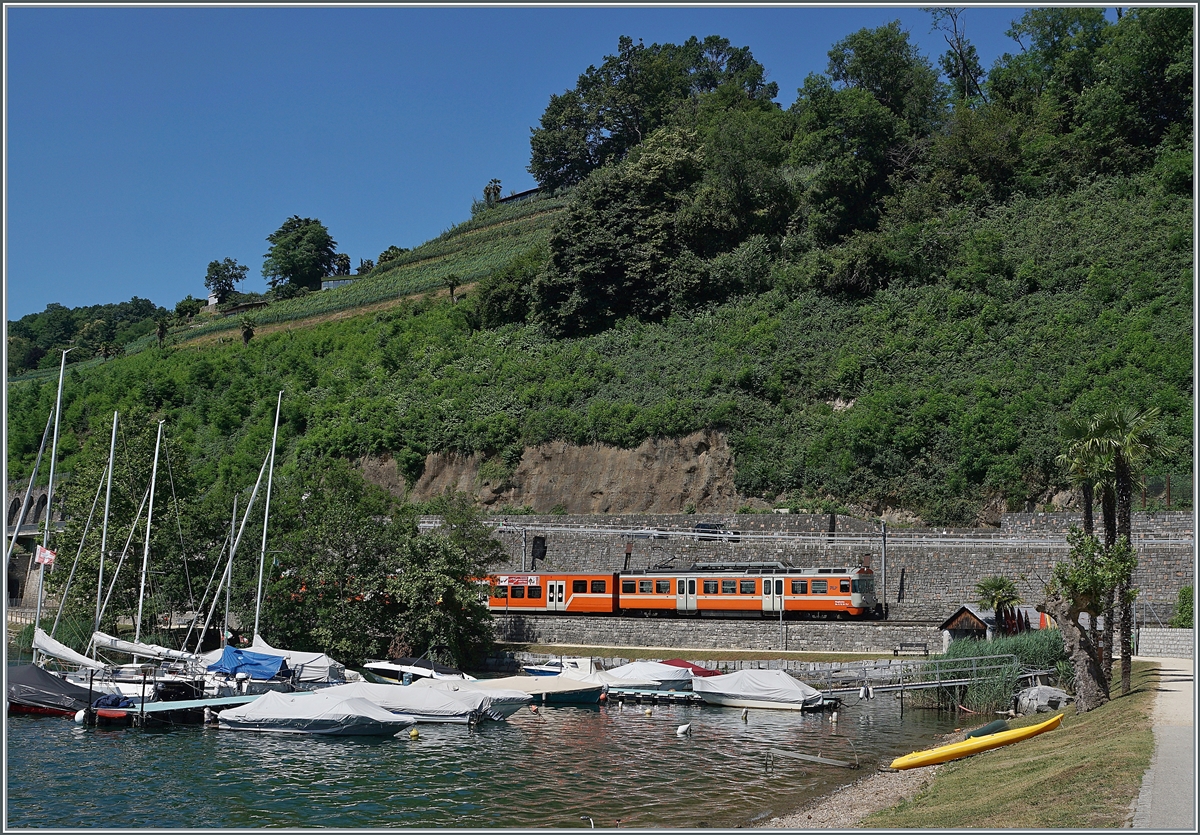 Der FLP Be 4/12 24  Magliaso  kurz nach Agno auf seiner Fahrt von Lugano nach Ponte Tresa.

23. Juni 2021