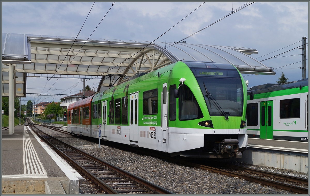 Der LEB RBe 4/8 41 beim Halt in Cheseaux. 
25. April 2014