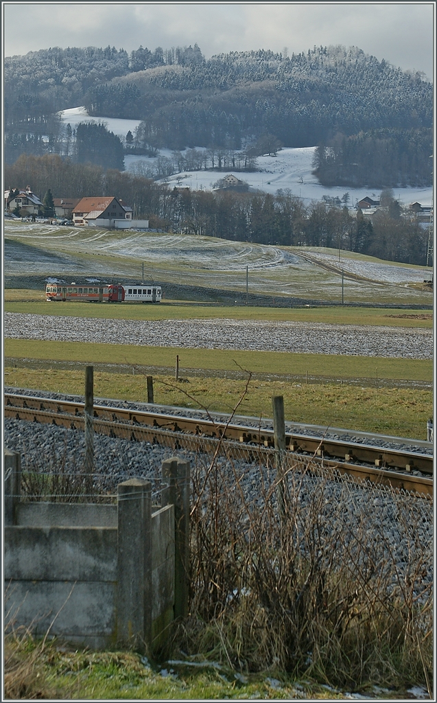 Der tpf Regionalzug 14834 erreicht in Kürze Bossennens. 12. Jan. 2013