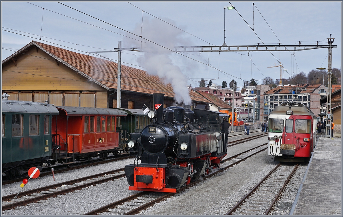 Die Blonay-Chamby G 2x 2/2 105 bei einer Rangierfahrt zum Umfahren ihres Zuges in Chatel St-Denis. 

3. März 2019