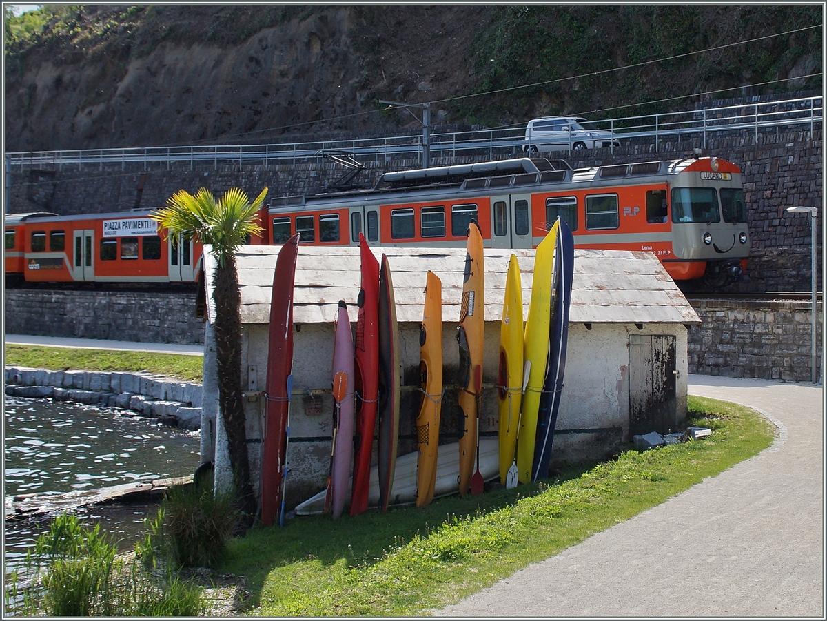 Diskret im Hintergrund, aber sehr zum Nutzen aller verbindet die FLP Lugano mit Ponte Tresa. FLP S60 181 bei Agno, als  Motiv verdeckt -Version.
 5. Mai 2014