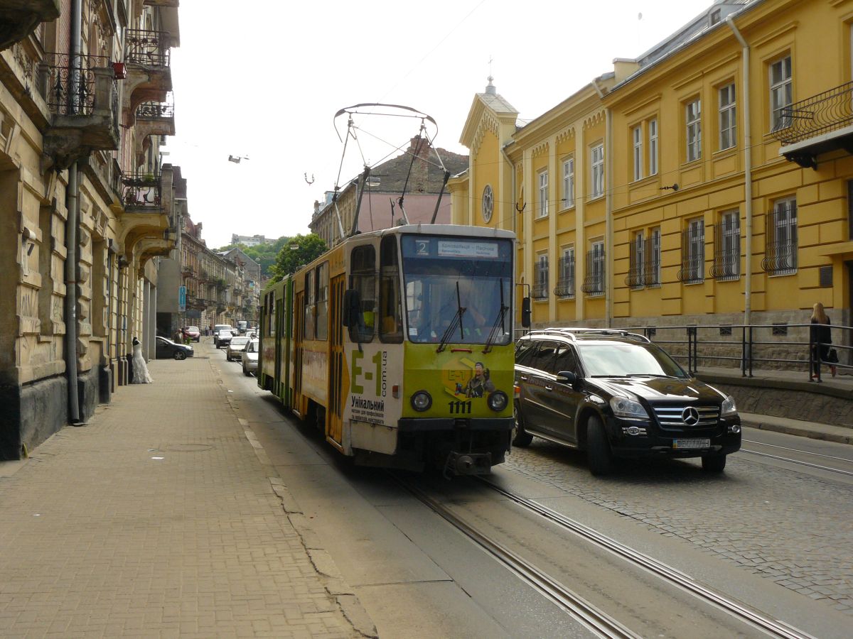 LKP (Львівське комунальне підприємство) LET (Lviv Elektro Trans) TW 1111 Tatra KT4SU Baujahr 1987. Ivana Franka Strase, Lviv, Ukraine 20-05-2015.

LKP (Львівське комунальне підприємство) LET (Lviv Elektro Trans) tram 1111 Tatra KT4SU bouwjaar 1987. Ivana Franka straat. Lviv, Oekrane 20-05-2015.