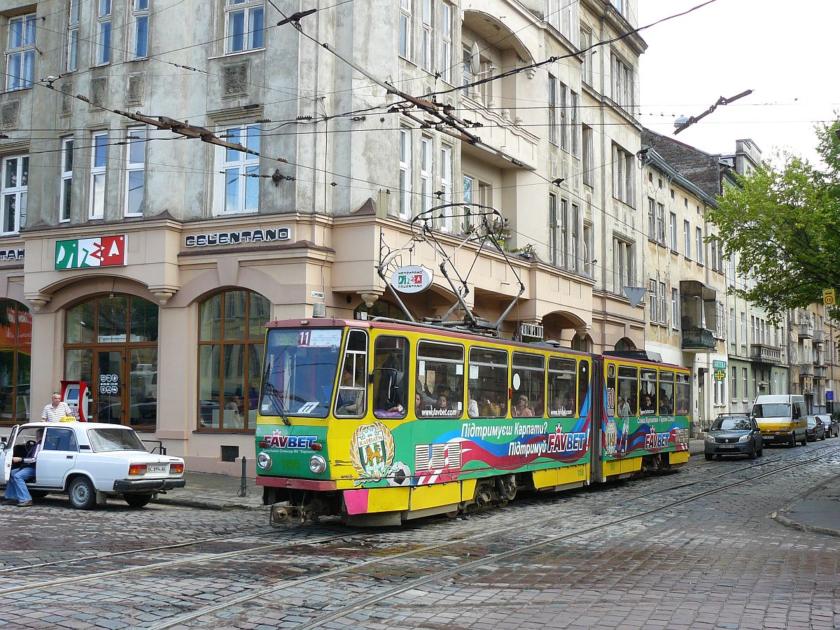 LKP (Львівське комунальне підприємство) Lviv ElektroTrans TW 1158 Rusovykhstraat, Lviv 16-05-2014.

LKP (Львівське комунальне підприємство) Lviv ElektroTrans tram 1158 Rusovykhstraat, Lviv 16-05-2014.