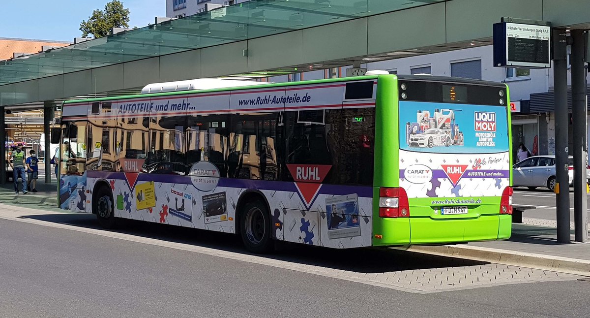 MAN Lion`s City von RhönEnergie steht am Busbahnhof in Fulda im Juli 2020