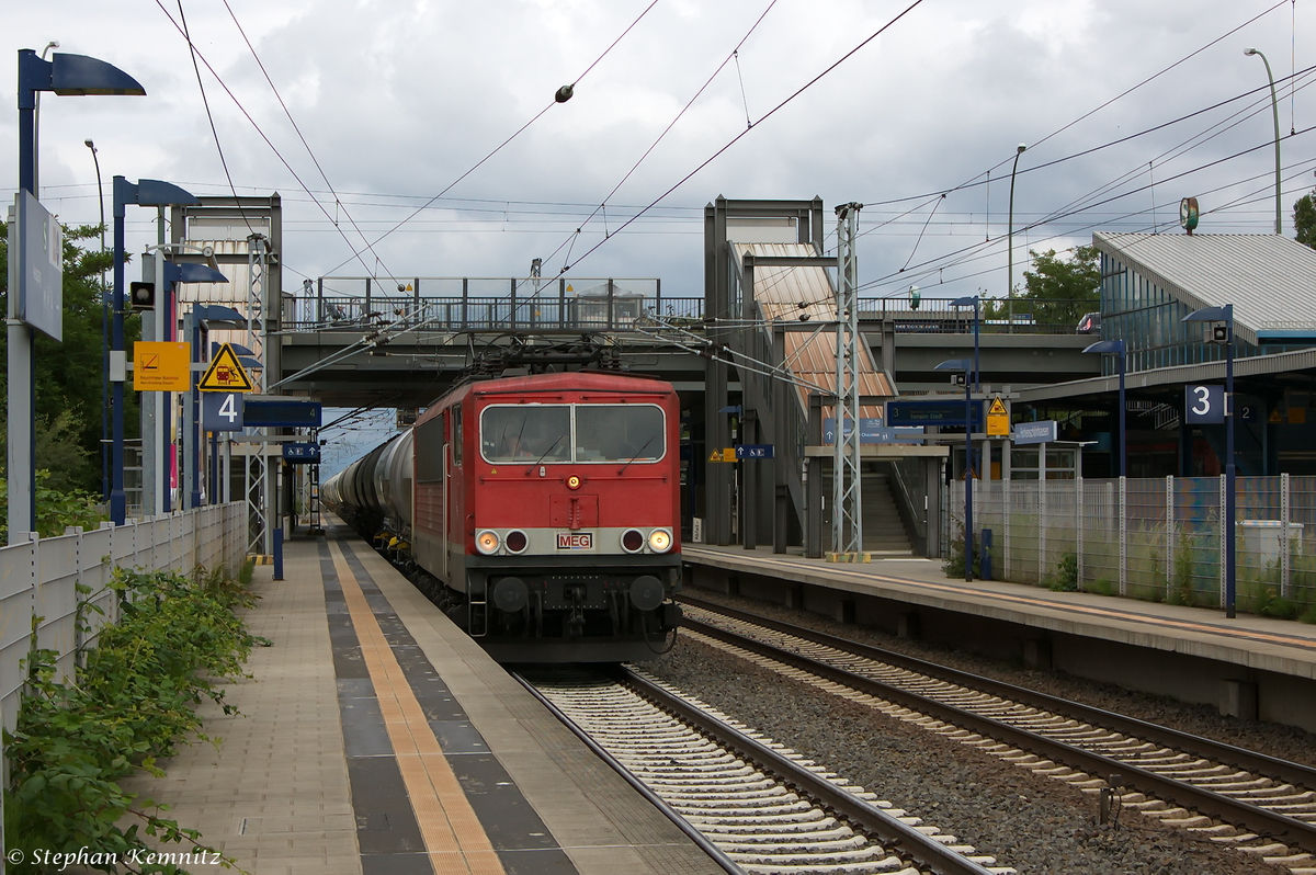 MEG 702 (155 179-5) Mitteldeutsche Eisenbahn GmbH mit dem leer Zementzug von Rostock-Seehafen nach Rdersdorf, bei der Durchfahrt in Berlin-Hohenschnhausen. Die 155 179-5 hatte dem Zug bis nach Berlin Nordost gebracht. 24.06.2014