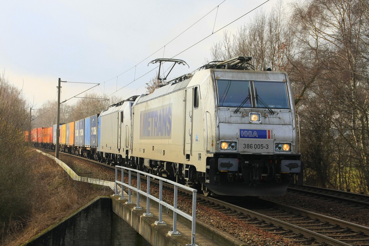 Metrans 386 005 + RPool/Metrans 186 143 mit Containerzug in Hamburg-Moorburg am 25.02.2015