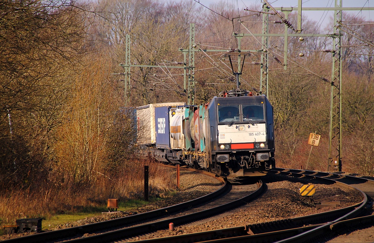 MRCE/TXL 185 407-4 mit dem DGS 45699 aufgenommen vom Bü Karpfenteich am Schleswiger Bahnhof. 23.02.2014