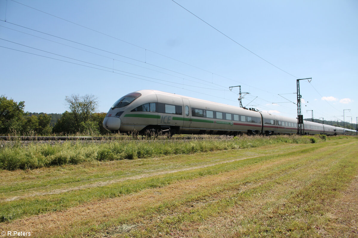 Nachschuss auf 411 020  Gotha  als ICE 23 Dortmund - Wien bei Oberdachstetten. 08.06.24