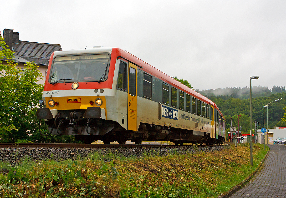 
Obwohl es heute regnete, musste ich einfach zum abschalten an die Strecke....
Der Dieseltriebzug 628 677-7 / 928 677-4 der Westerwaldbahn (WEBA) fhrt am 08.07.2014 vom Haltepunkt Alsdorf weiter  in Richtung Daaden.

Er befhrt die 10 km lange Daadetalbahn (KBS 463) als RB 97  Daadetalbahn  von Betzdorf/Sieg nach Daaden.