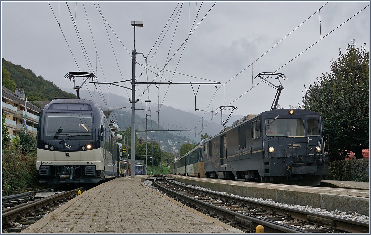 Während in Chernex der MOB Alpina links im Bild rangiert, wartet die MOB GDe 4/4 6002 mit ihrem Panoramic Express auf die Abfahrt nach Montreux.

4. April 2019