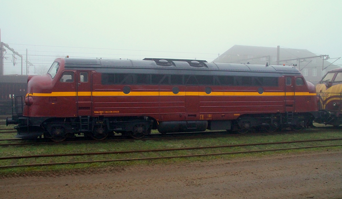 Wieder eine NOHAB die noch länger unterwegs ist...Die CFL MY 1146(92 86 0021 146-2 DK-CFLCD, REV/DK/01.09.13)steht hier bei typischen nebeligen Nordwetter im dänischen Padborg abgestellt. 12.12.2013