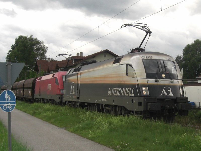 1116 280-7 als  A1  mit einem Gterzug vom Zementwerk in
Rohrdorf in Richtung Rosenheim unterwegs. Aufgenommen am 
10. Juli 2009 in Thansau.