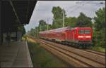 DB Regio 112 122 mit dem RE3 Stralsund Hbf  FahrradExpress  am 16.06.2014 durch Panketal-R�ntgental