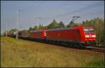 DB Schenker 185 194-8 mit Wagenlok 145 008 und einem kurzen G�terzug am 16.09.2014 durch die Berliner Wuhlheide