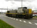 NMBS Lokomotive 7849. Bahnbergang Polderdijkweg Hafen Antwerpen 10-05-2013.

NMBS locomotief 7849. Overweg Polderdijkweg haven Antwerpen 10-05-2013.