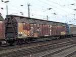Habiis Vierachsiger, gro�r�umiger Schiebewandwagen der Firma Trans Wagon nummer  83 80 D-TWA 2848 605-1 mit Aufschrift  Wir fahren f�r Volkswagen und Audi  Rangierbahnhof K�ln Kalk Nord 08-03-2018.