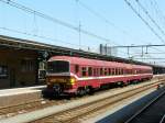 NMBS MS86 treinstel 944 als stoptrein naar Antwerpen op spoor 3a in Roosendaal 18-07-2013.