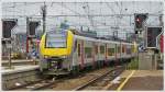 . Voilà die belgische Version des Siemens Desiro ML - Am 10.05.2013 verlassen zwei gekuppelte AM08 (051 und 049) als L Zug nach Louvain/Leuven/Löwen den Bahnhof Bruxelles Midi. (Jeanny)