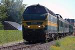 Leider mit Gegenlicht wird am 4 Juli 2026 SDP 6219 mit der Pendelzug nach Baasrode Nord beim ausfahren aus Puurs fotografiert.