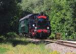 Mit etwas Zooming wird am 4 Juli 2026 bei Puurs von F�sspfad der Einfahrt von Train 1900/AMTF 507 'ENERGIE  mit der Pendelzug fotografiert.
