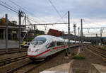 Der DB ICE-3M (BR 406) Tz 4611 'Düsseldorf' verlässt am 03.10.2015, als ICE 18 von Frankfurt a.M. Hbf via Köln Hbf, den Bahnhof Liège Guillemins (Lüttich-Guillemins) und fährt weiter in Richtung Bruxelles-Midi.