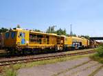 Dreischwellenstopfmaschine P&T 09-3x Dynamic(99 80 9123 001-6 D-SPAG)abgestellt beim alten Gbf Neumünster(öffentliche Zufahrt). 09.06.2014