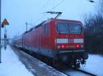 143 852-2 mit S1 von Warnemnde Richtung Rostock Hbf kurz nach der Ankunft im Bahnhof Rostock-Bramow.(07.12.10)