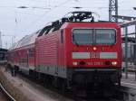 143 225-1(DB Regio Halle)kurz nach der Ankunft mit einem Schad-Zug im Rostocker Hbf.(16.03.2011)