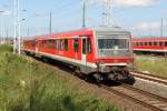 928 658-4 kam als Leerfahrt zurck aus Lbeck hier bei der Einfahrt im Rostocker Hbf.02.09.2011