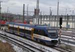 VT 0004 als OLA79765 von Rostock Hbf nach Gstrow bei der Ausfahrt im Rostocker Hbf.01.02.2012