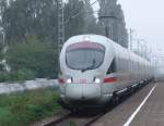 411 071-4 als ICE 1611 von Warnemnde Richtung Mnchen Hbf bei der Durchfahrt am Hp Rostock-Holbeinplatz.(11.09.10)