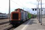 Das V100-West Doppel 212 261-2 & 212 270-3 der NBE (Nordbayerische Eisenbahn) mit einem leeren Holzzug in Rathenow in Richtung Wustermark unterwegs.