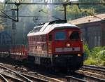 DB 232 569-4 im Gegenlicht aufgenommen bei der Durchfahrt in HH-Harburg.