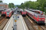 Von links; 218 461-2; 612 083; 218 393-7 und 218 260-8 und 650 317-1, alle mit Nahverkehrszug in Memmingen am 21.05.2009.