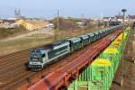 30.03.2014 17:12 Uhr - Ein mit der Maxima bespannter Enercon-Kieszug durchfährt aus Richtung Buckau kommend Magdeburg-Sudenburg in Richtung Westen.
