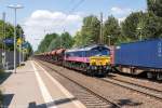 29003 (266 015-7) Heavy Haul Power International GmbH mit einem Facs Ganzzug in Bienenbüttel und fuhr weiter in Richtung Uelzen. 12.06.2015