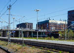 Die zurzeit an die DB Fahrwegdienste GmbH vermietete 276 034-6 (92 80 1276 034-6 D-NRAIL) eine Vossloh G 1206 der northrail GmbH (Hamburg) fährt am 21 April 2026, mit einem Flachwagenzug beladen