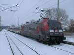 101 110-5 und der IC 2212 Koblenz-Binz,am 21.Mrz 2013,beim Halt in Bergen/Rgen.