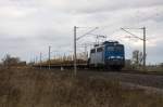 140 042-4 PRESS (140 834-3) mit einem leeren Holzzug in Vietznitz und fuhr in Richtung Nauen weiter.