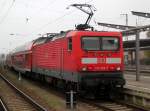 Die neu Rostockerin 114 003-7 stand am 15.11.2014 mit RE 4359 von Rostock Hbf nach Lutherstadt Wittenberg im Rostocker Hbf.