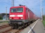 114 027-6 mit RE38591 von Warnemnde Richtung Berlin Hbf(tief)abgestellt im Bahnhof Warnemnde(02.10.10)