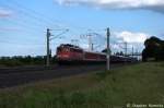 115 383-2 mit dem DZ 2861  Kreuzfahrer  von Berlin Gesundbrunnen nach Rostock Seehafen in Vietznitz.