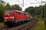 111 151-7 zieht den RE 9 (Rhein-Sieg-Express) Siegen - Kln - Aachen, hier am 04.08.2012 durch Scheuerfeld (Sieg).