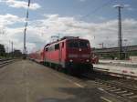 111 023-8 bei der Einfahrt in den Rosenheimer Bahnhof am  26.