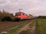 111 202-8 schiebt eine RB W�rzburg bei Th�ngersheim.