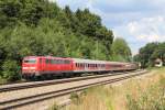 111 065-9 mit einem Regionalzug auf dem Weg von Mnchen nach Salzburg.