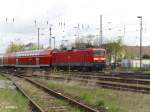 114 002-9 schiebt den RE1 in den Bahnhof Eisenh�ttenstadt.