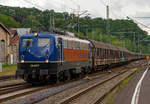 
Die 139 287-7 (91 80 6139 287-7 D-BYB) der BayernBahn GmbH fährt am 09.06.2020, mit dem sogenannten  Henkelzug  (Langenfeld/Rhld. nach Gunzenhausen), durch Betzdorf (Sieg) in Richtung Siegen.  

Die Lok wurde 1963 von Krauss-Maffei AG in München-Allach unter der Fabriknummer 18956 gebaut, er elektrische Teil ist von den Siemens-Schuckert-Werke (SSW) in Berlin. Als DB E10 287 wurde in Dienst gesetzt, mit der Einführung des EDV-Nummernsystems wurde sie zum 01.01.1968 zur DB 110 287–0. Die Lok ist mit Einholmstromabnehmern ausgerüstet, sie ist die letzte gebaute Kasten 110er. Zur 139er wurde sie erst 1994 nach einem Umbau, der Lokkasten wurde auf Drehgestelle der Baureihe 140 (E40) gesetzt und es folgte die Umzeichnung in DB 139 287-7. Zum Mai 2009 erfolgte die Z-Stellung bei der DB AG.

Zum 1.Oktober 2011 wurde die Lok durch die BayernBahn GmbH erworben und erhielt anschließend eine Untersuchung. Die Neulackierung in kobalt-blau/orange erhielt sie dann 2017.